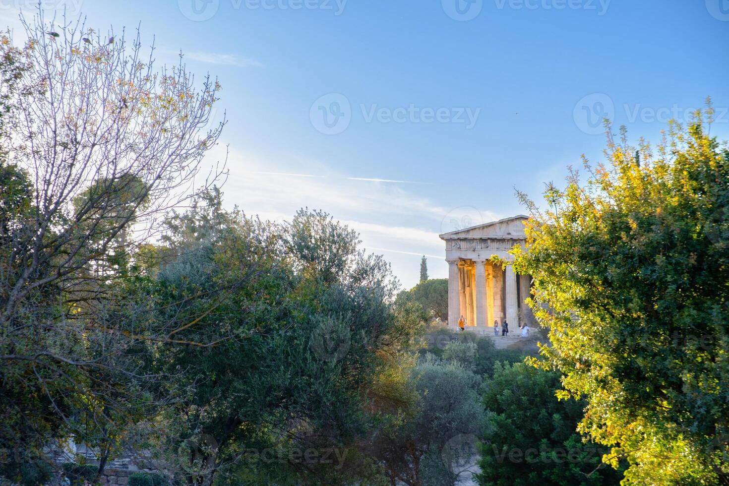Temple of Hephaestus behind trees, ancient Agora of Athens, Athens, Greece photo