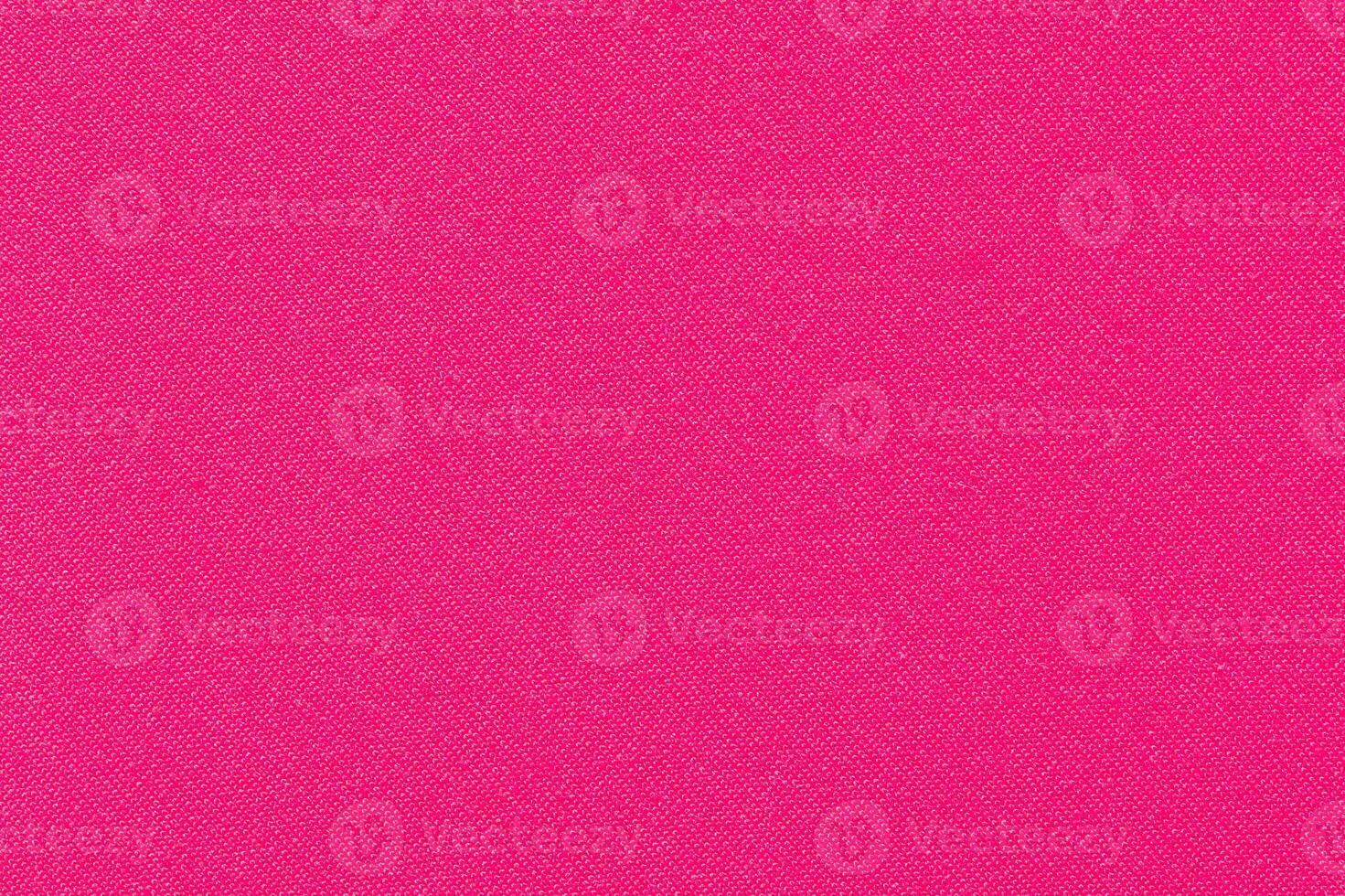 Bright pink fabric texture with smooth surface and vivid color for textile design and fashion inspiration. photo
