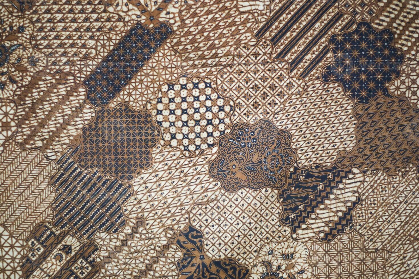 Peach fuzz and mixed colors floral patterns of seamless Indonesian batik. photo