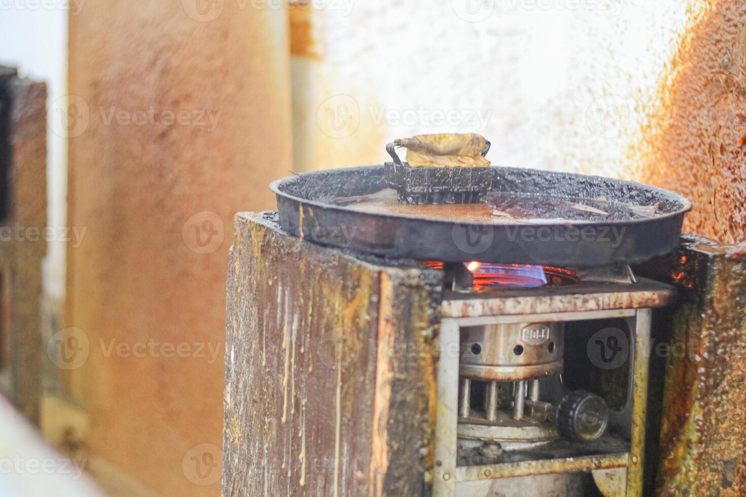 Close-up view of the batik stamping process. Making batik cloth by stamping. photo