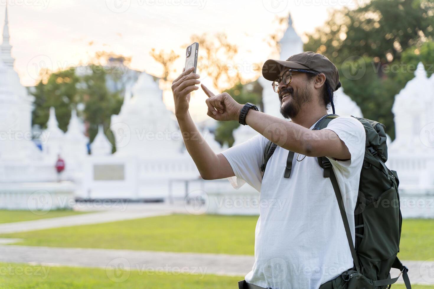 Happy man blogger Caucasian guy male influencer blogger cheerful smile tourist traveler social media channel record blog travel. photo