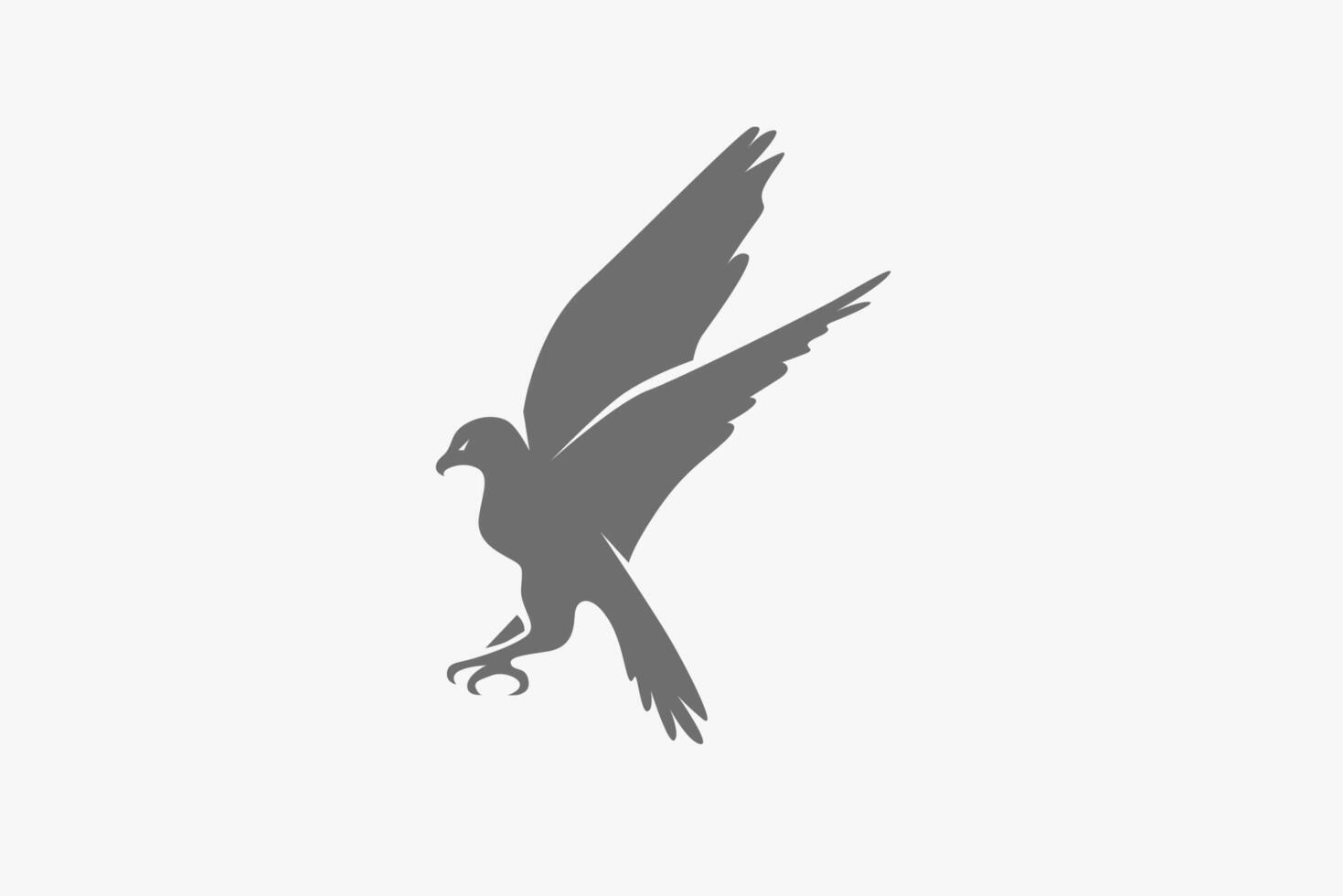 Falcon attack grab the prey with claws silhouette logo vector