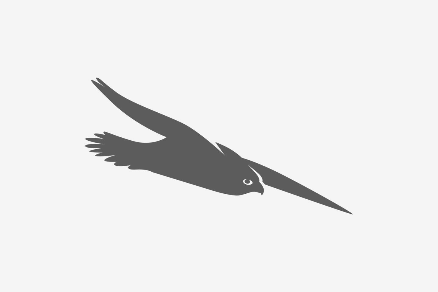 Flying falcon find a prey with detail feather at tail silhouette logo vector