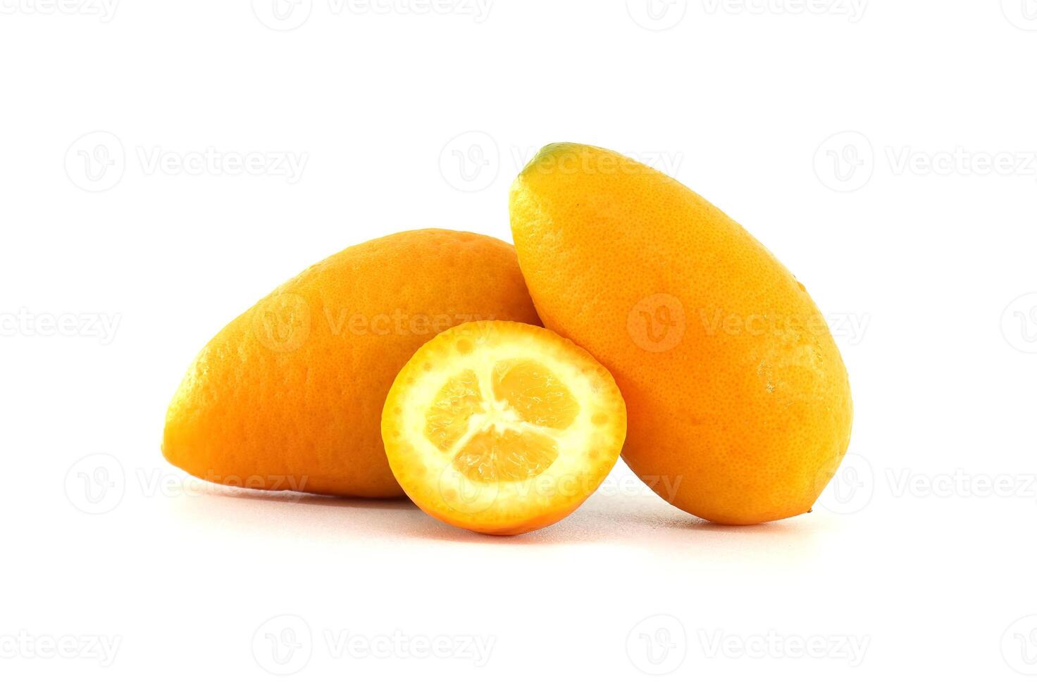 Fresh Kumquats and a Sliced Piece on a White Background photo