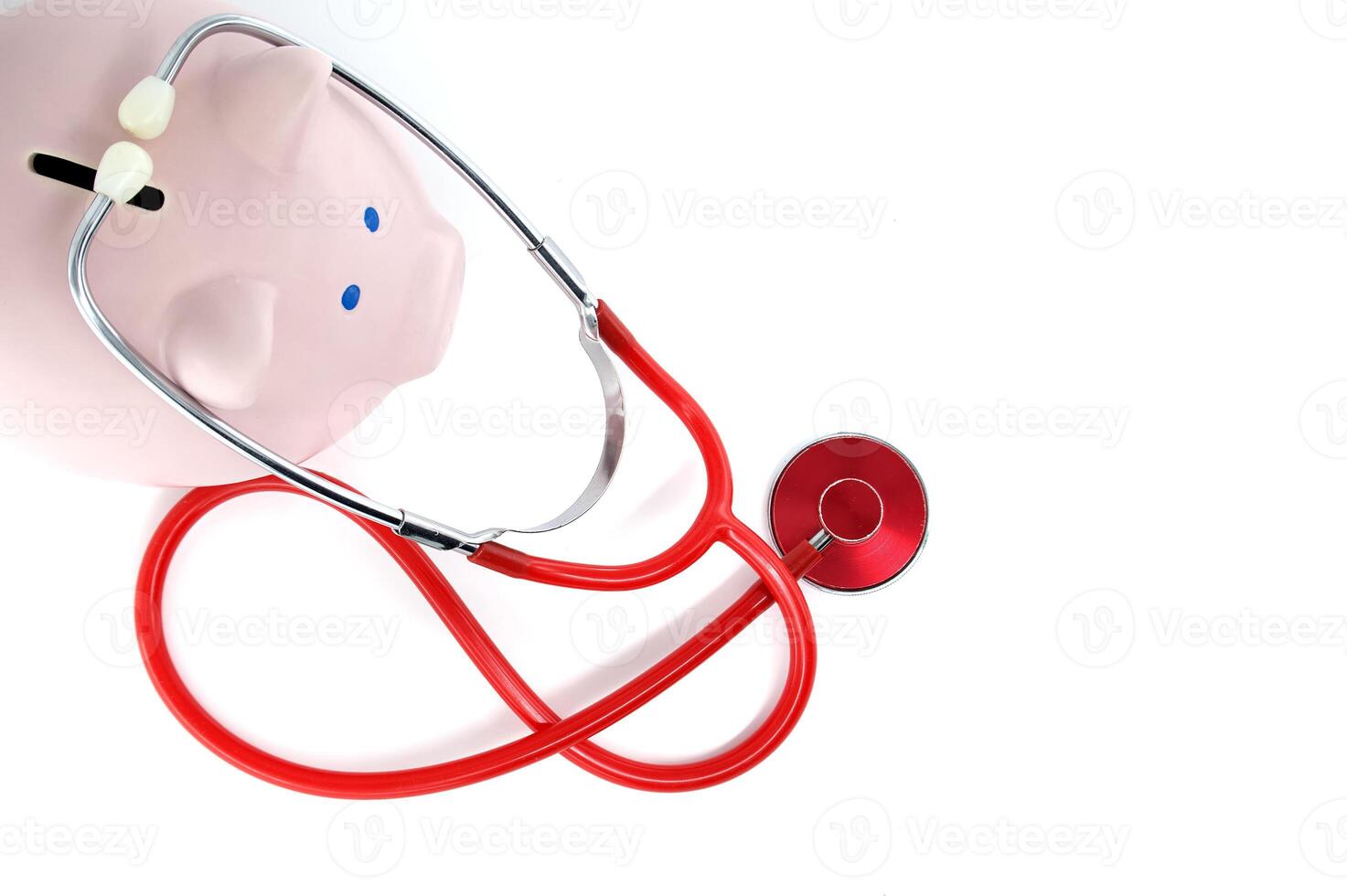 Piggy Bank With Stethoscope Symbolizing Financial Health And Security photo