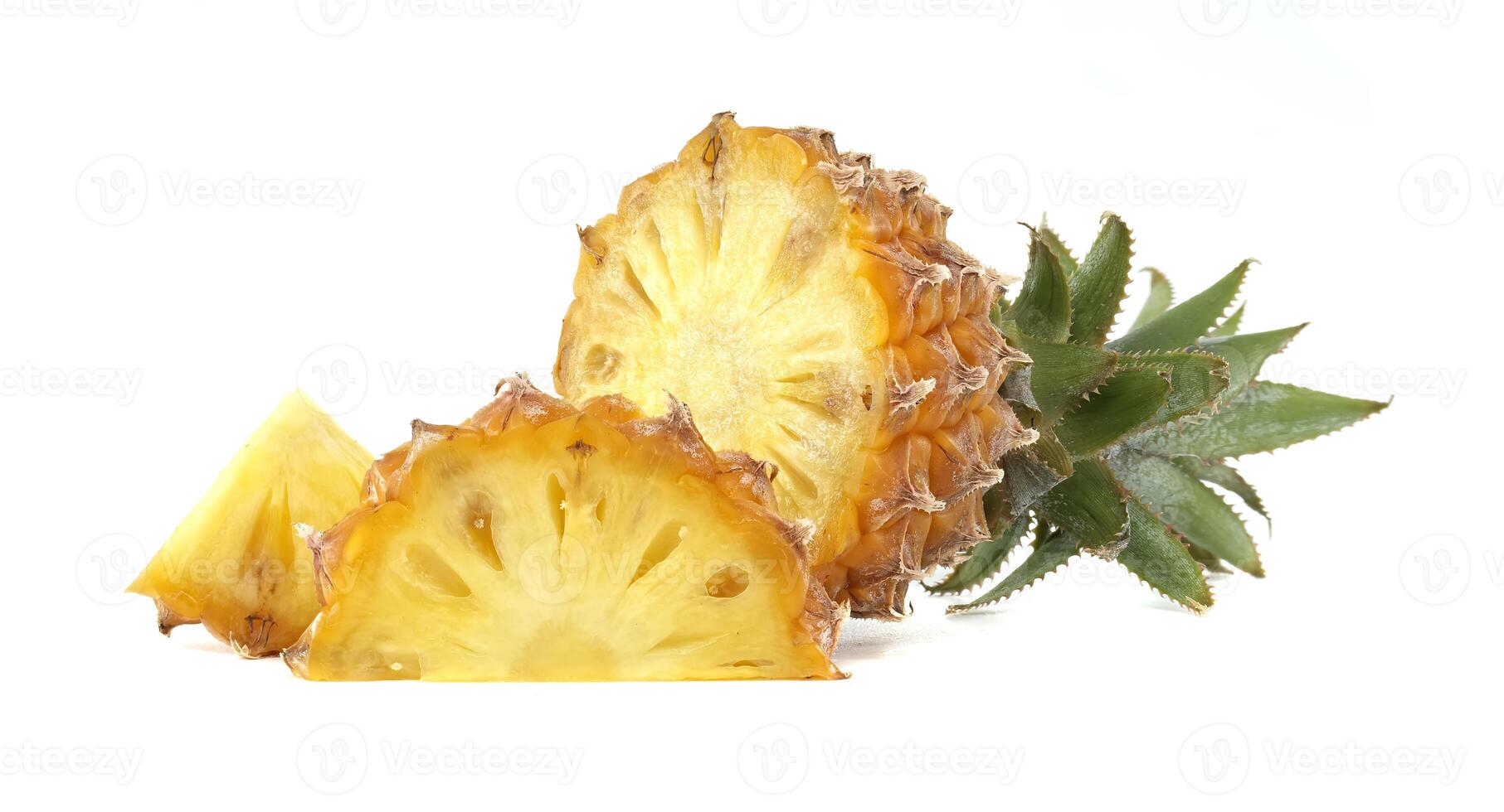 Fresh Pineapple with Slices on a White Background photo