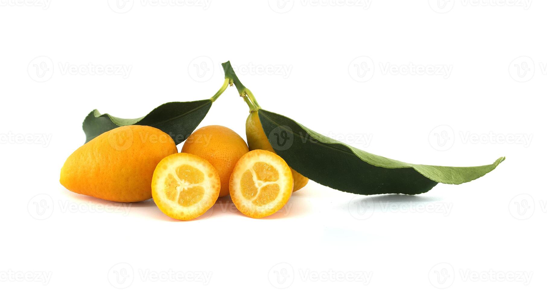 Fresh Ripe Kumquats With Green Leaves on White Background photo