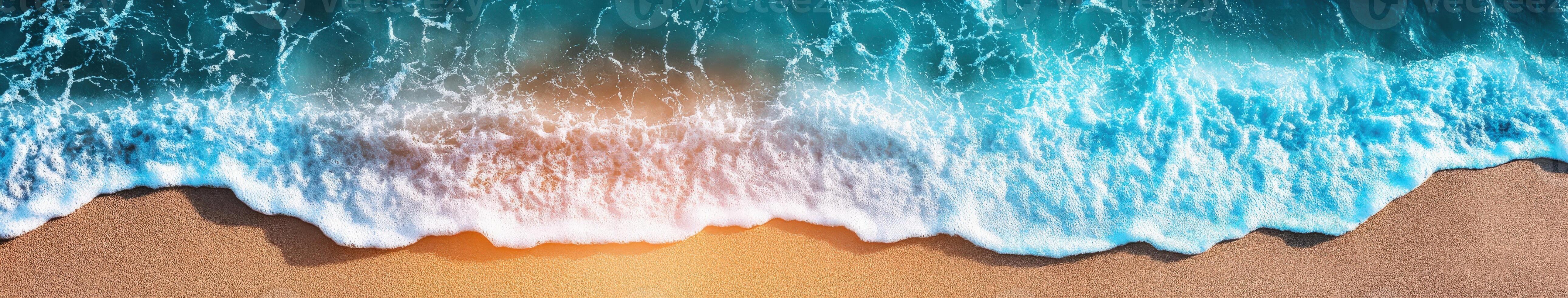 Waves gently lap at a sandy beach during sunset in a coastal paradise photo