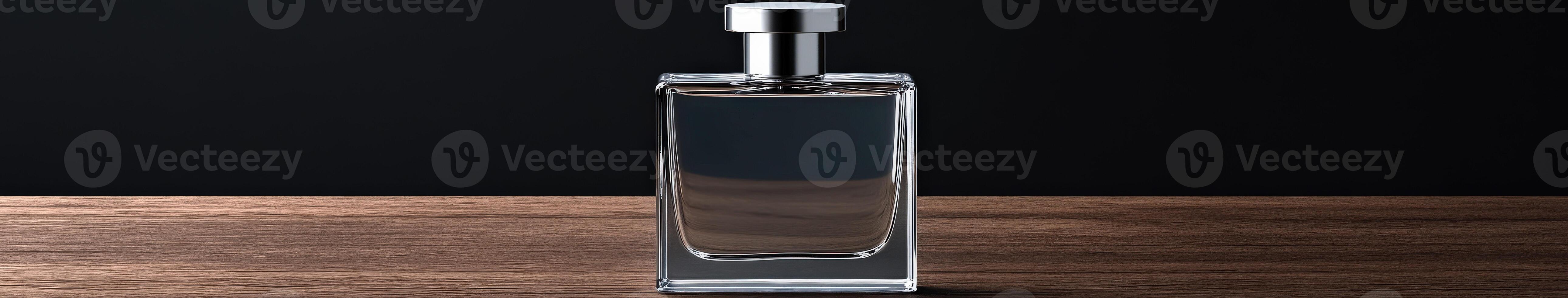 Elegant glass perfume bottle on wooden surface in soft lighting photo