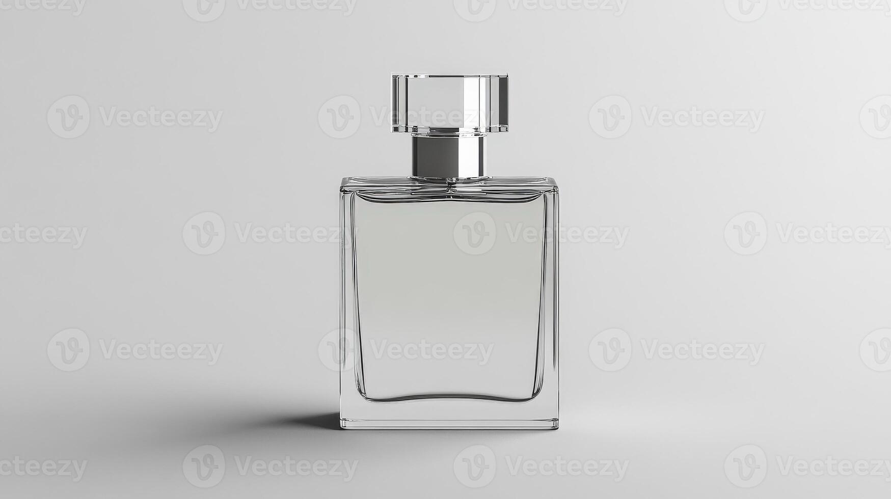 Elegant clear glass perfume bottle displayed on a minimalistic background photo