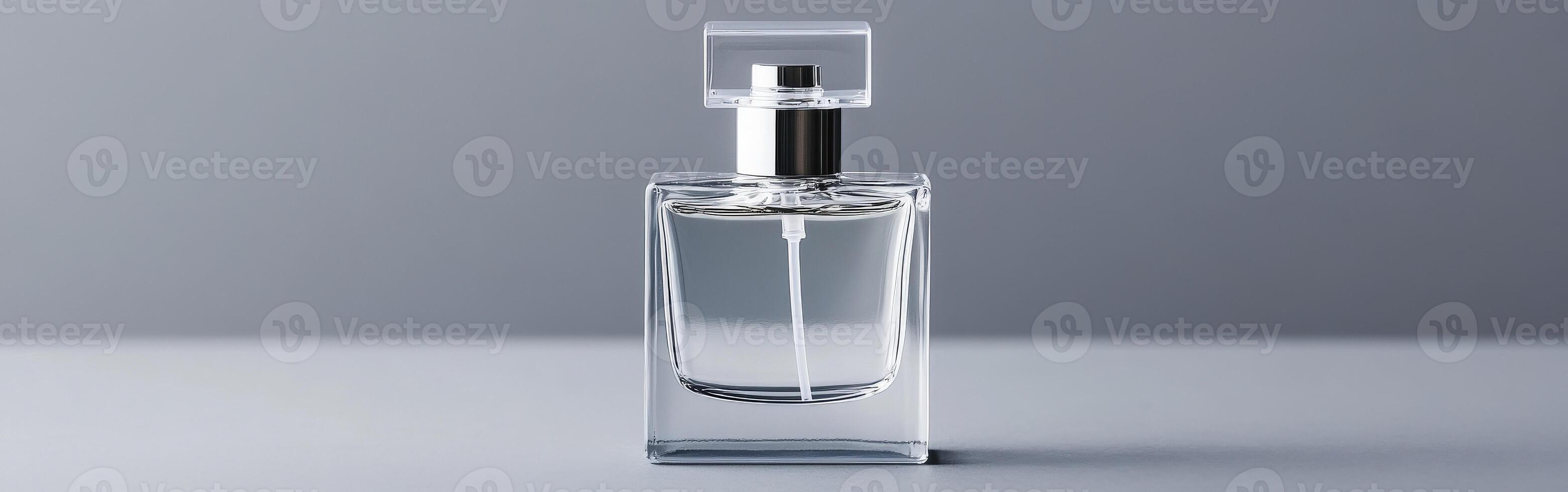 Elegant glass perfume bottle placed on a minimalist surface and background photo