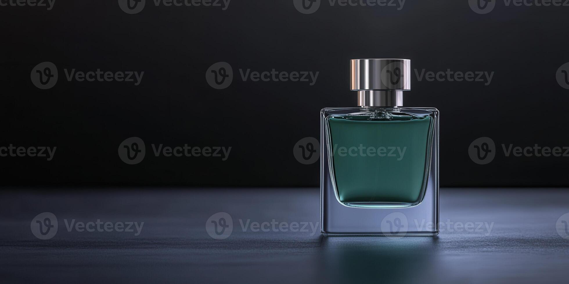 Elegant glass bottle of fragrance displayed on a dark surface photo