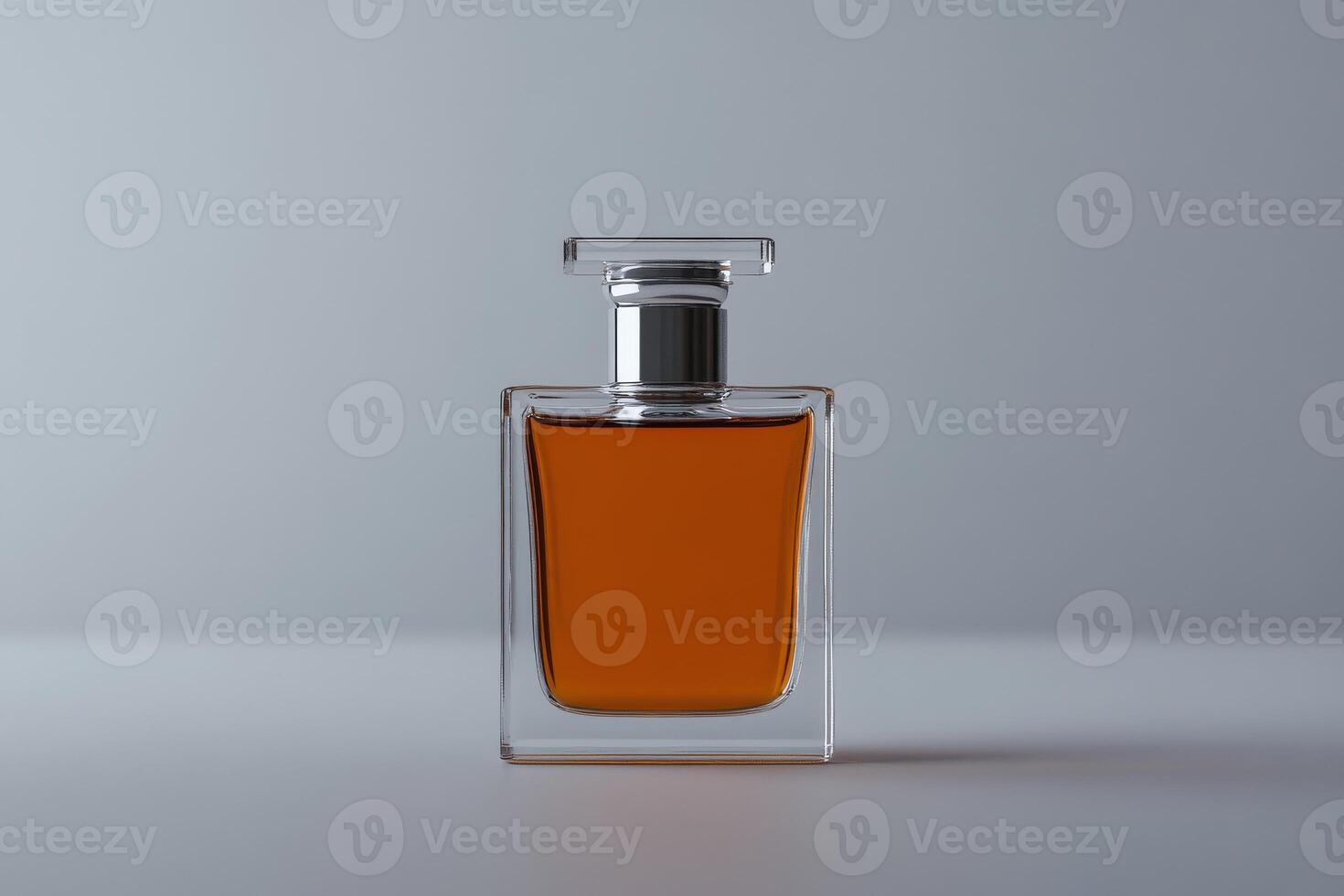 Elegant glass perfume bottle with rich amber liquid on simple background photo