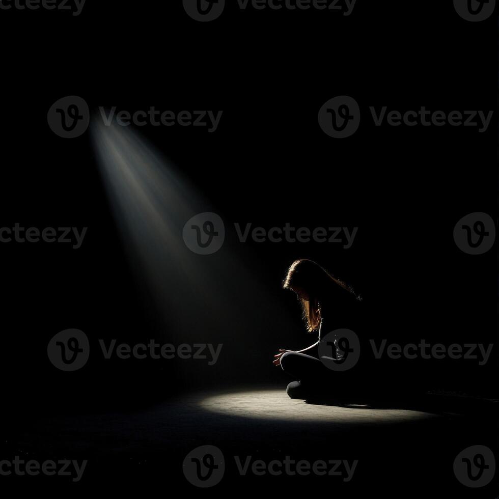 Silent reflection in darkness during a moment of solitude photo
