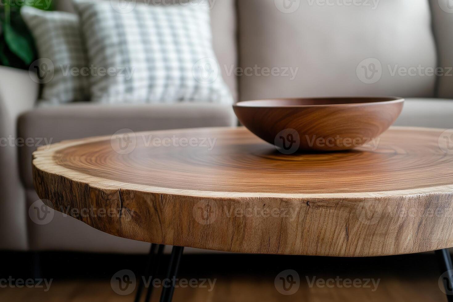 Unique wood coffee table with minimalist design and decorative bowl photo