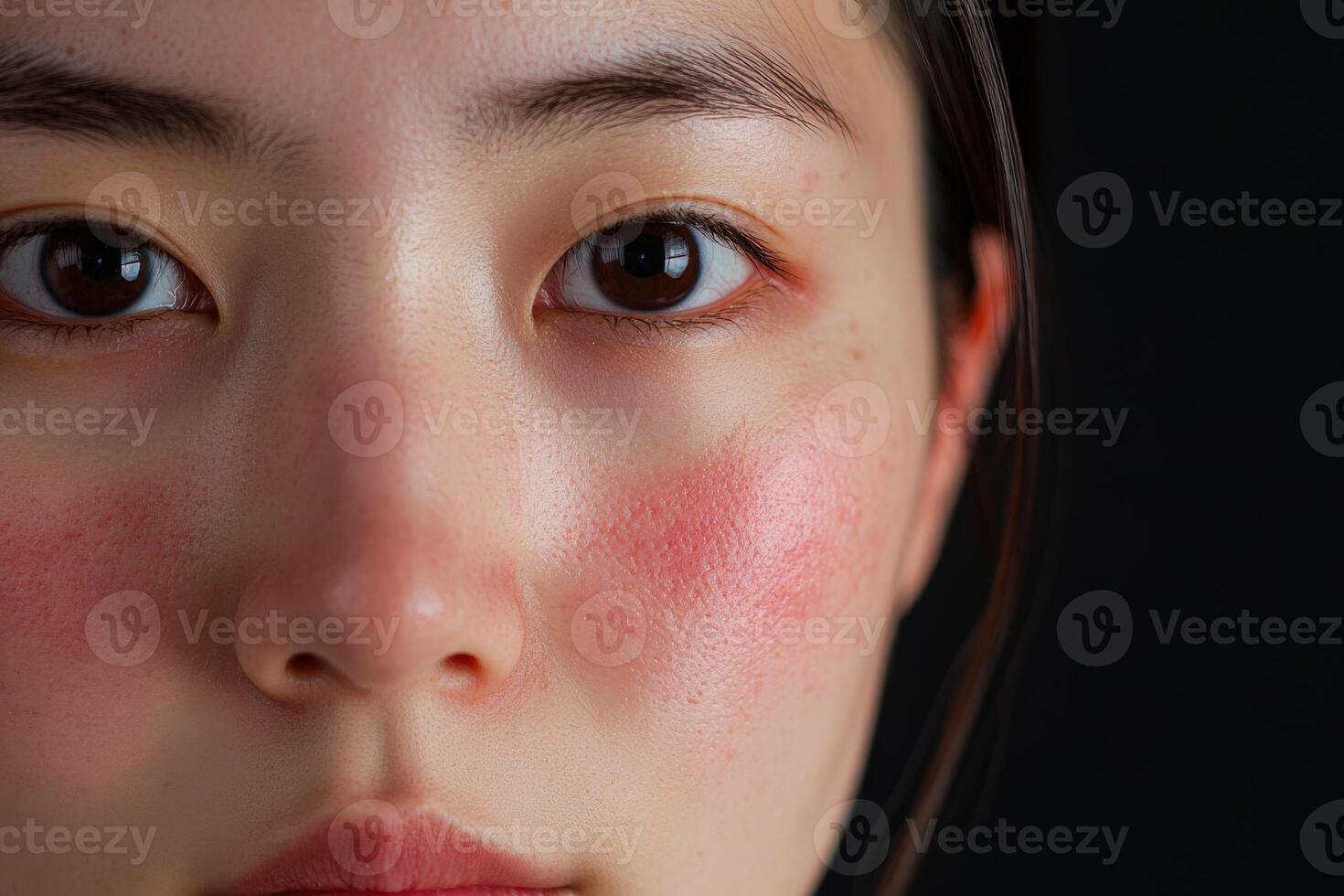 Close-up of a person's face showing natural beauty in soft light photo