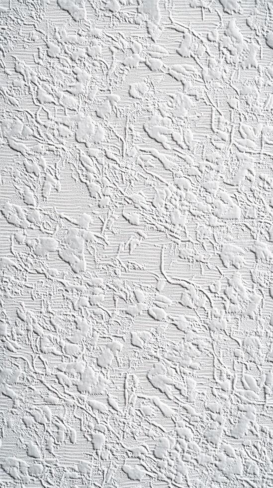 Textured white wall with detailed pattern showcasing unique design elements photo