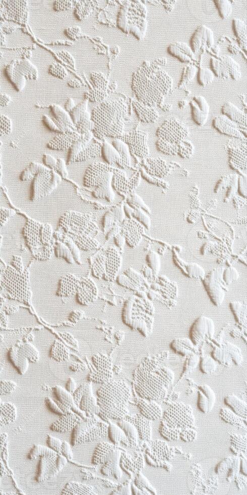 Elegant white lace fabric with floral pattern for textile design projects photo