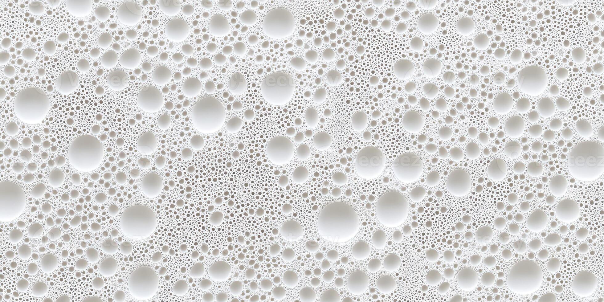 Bubbles forming a frothy texture on a smooth surface during preparation photo