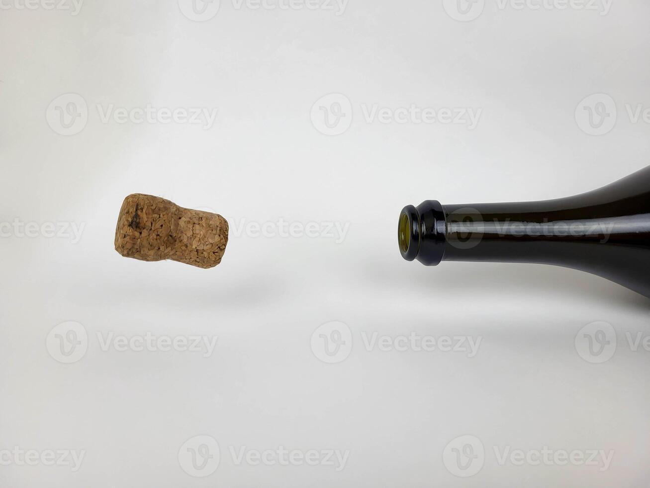 The cork flew out of the champagne bottle. The concept of the holidays of Christmas, New Year, Valentine's Day, March 8 photo