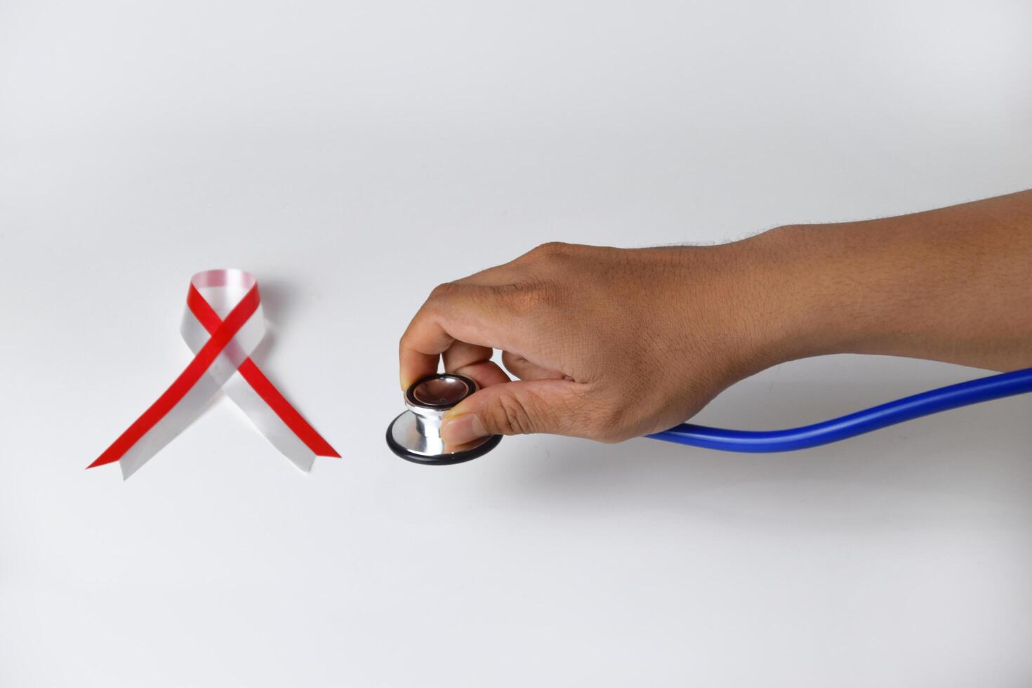 Closeup photo of a hand holding a Stethoscope