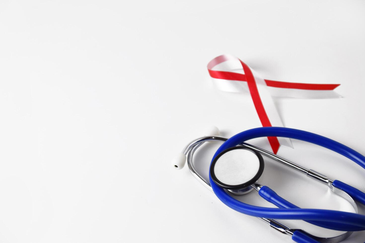 Doctors stethoscope with patriotic ribbon concept photo