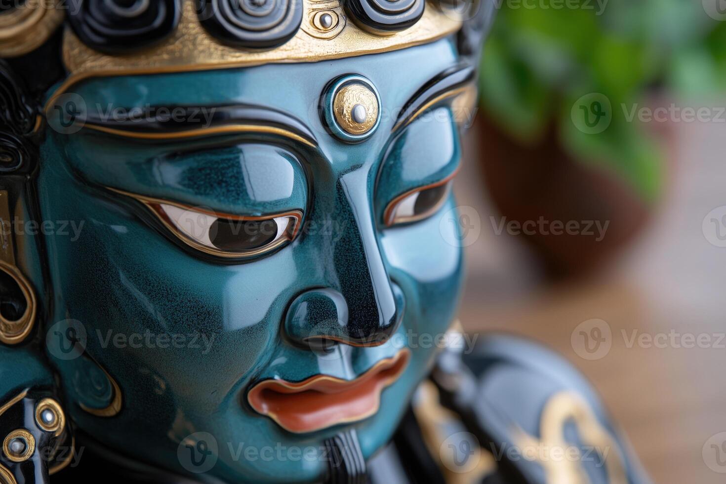 Close up portrait of an oriental buddhist or hindu statue photo