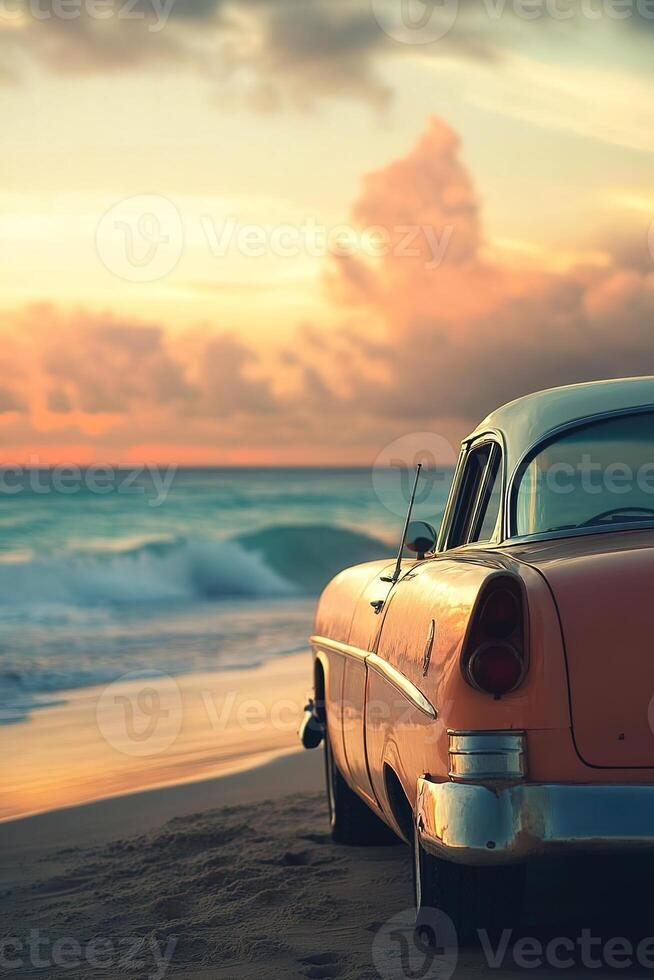 vertical image red retro car is parked on the beach with the ocean in the background at sunset or sunrise photo