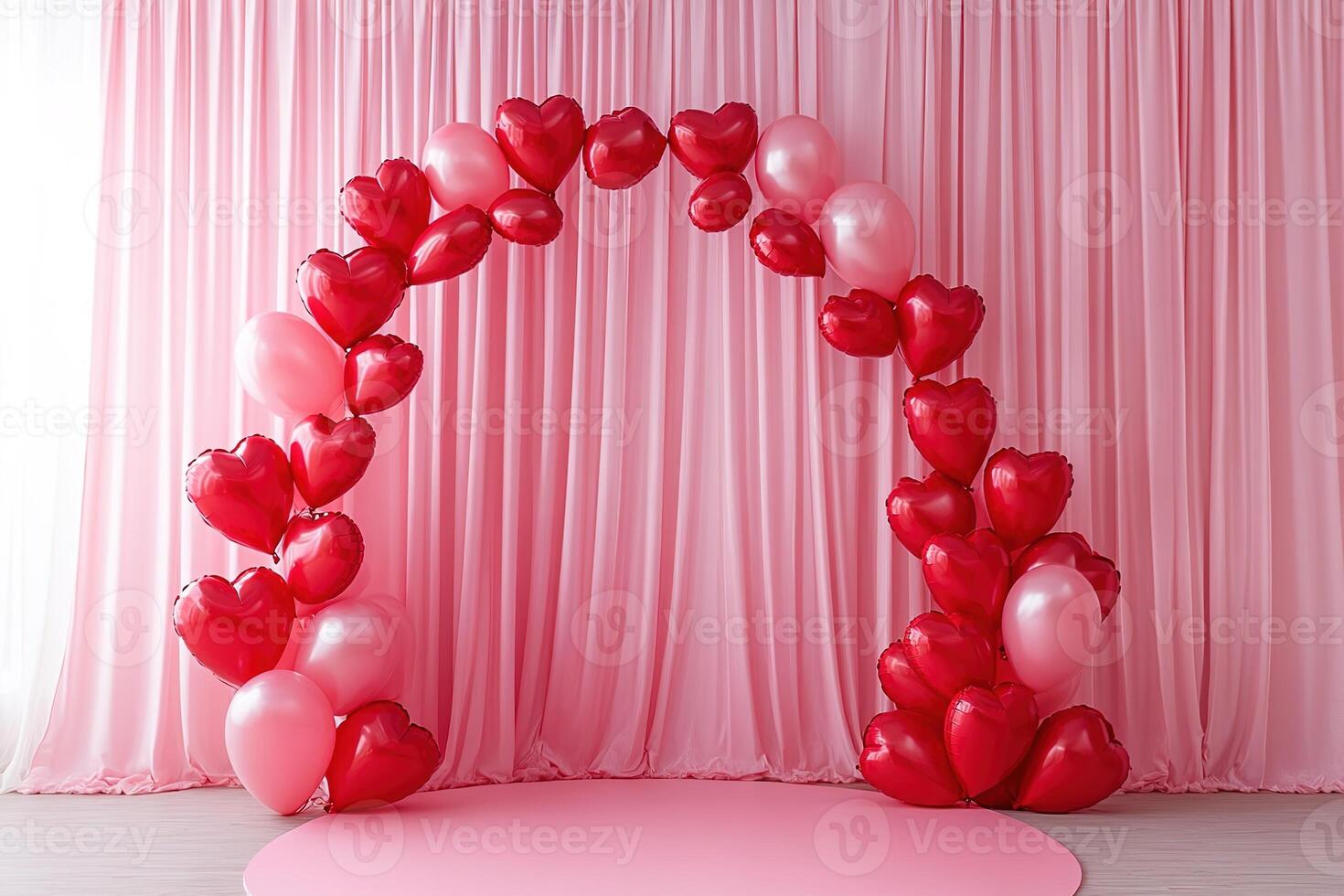 arc of red heart-shaped balloons on pink fabric curtain background, valentines day, wedding, birthday backdrop photo
