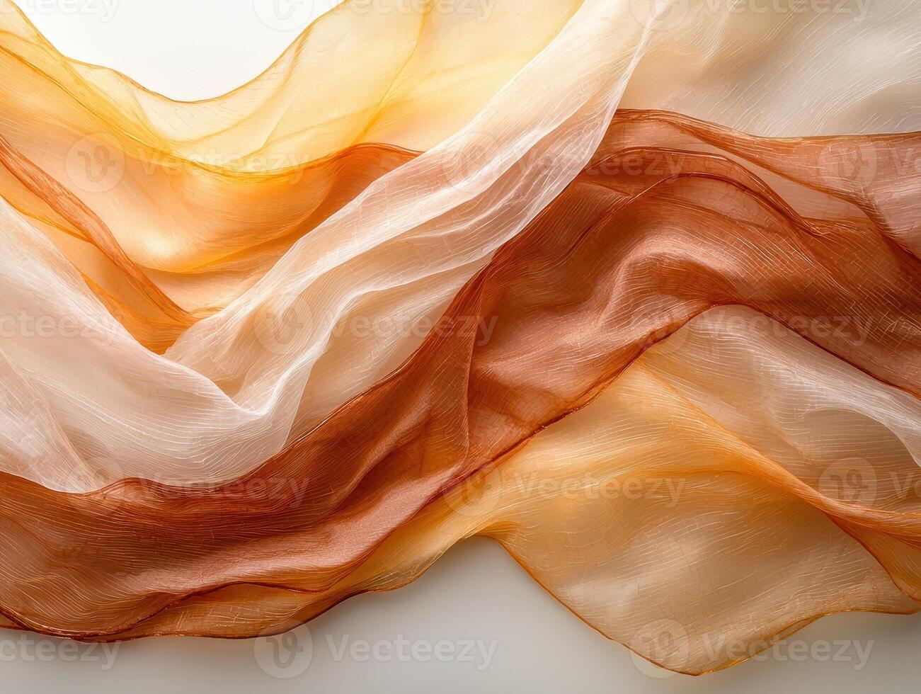 Abstract image of flowing fabric in orange and beige tones photo