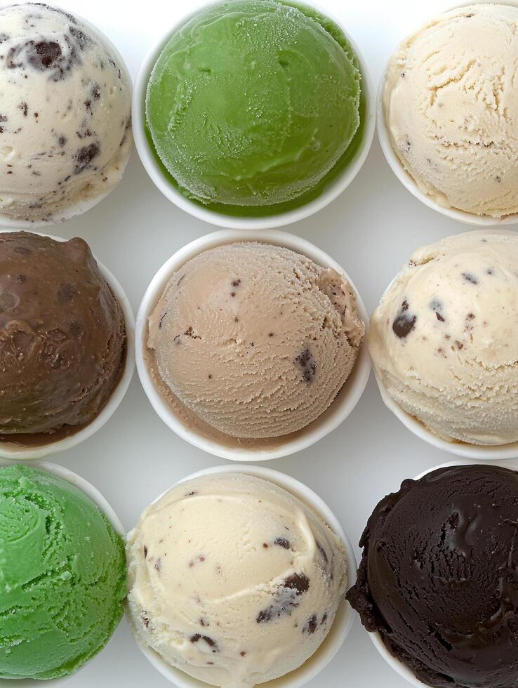 Close up of assorted ice cream scoops in bowls photo