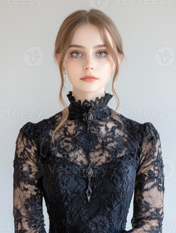 A portrait of a young woman in a black dress photo