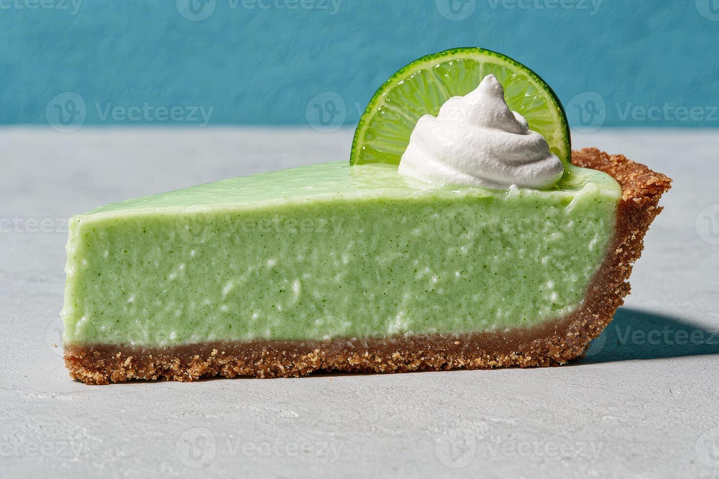 Key lime pie slice with whipped cream photo