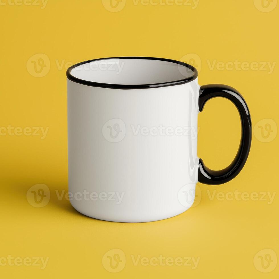 A white mug with black rim on yellow background photo
