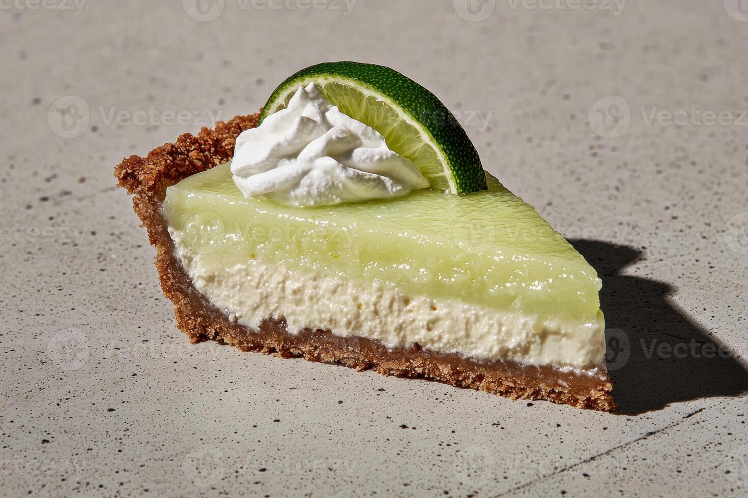 A slice of key lime pie with whipped cream photo