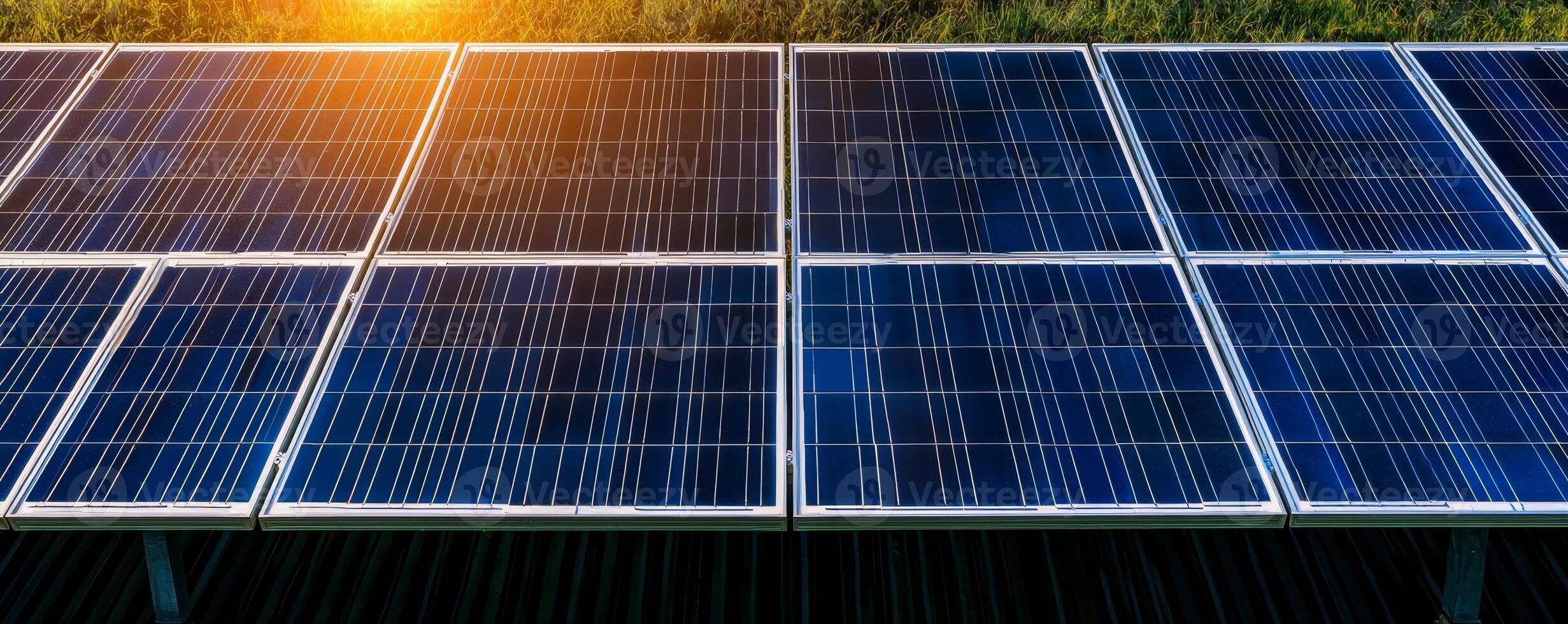 Peak energy grid concept. Solar panels capturing sunlight at sunrise. photo