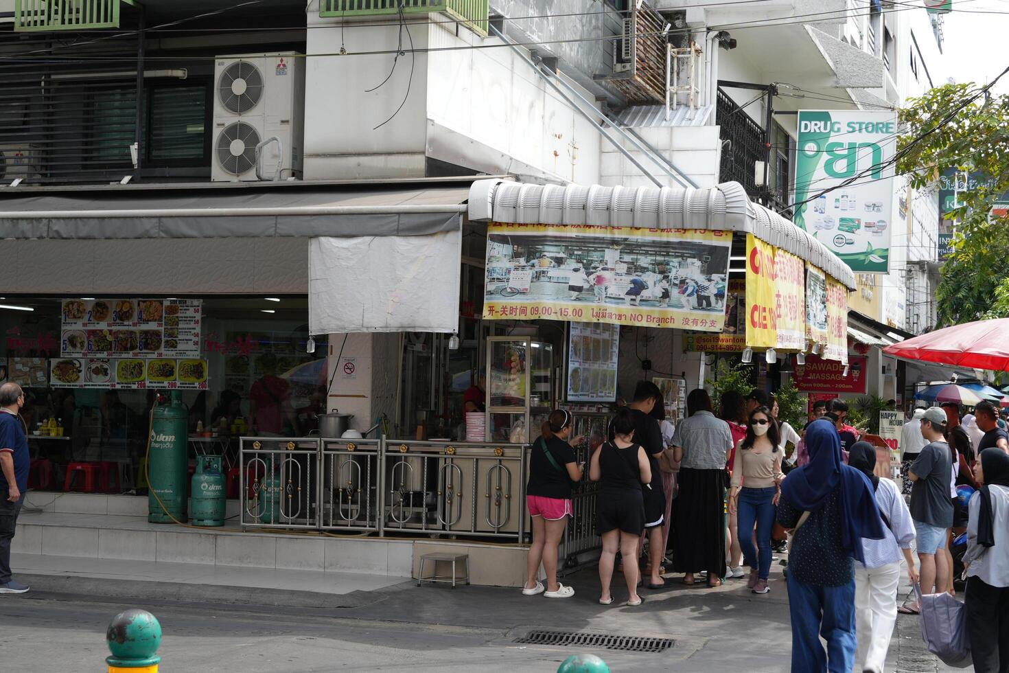 Bangkok, Thailand, 2024 - sabx2 wanton mee stall, pratunam famous, people queue in line to eat at Thai Wonton Noodle shop, locals favourite photo