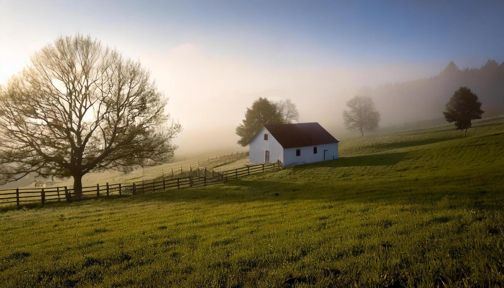 Tranquil Rural Landscape with White Barn and Misty Sunrise photo