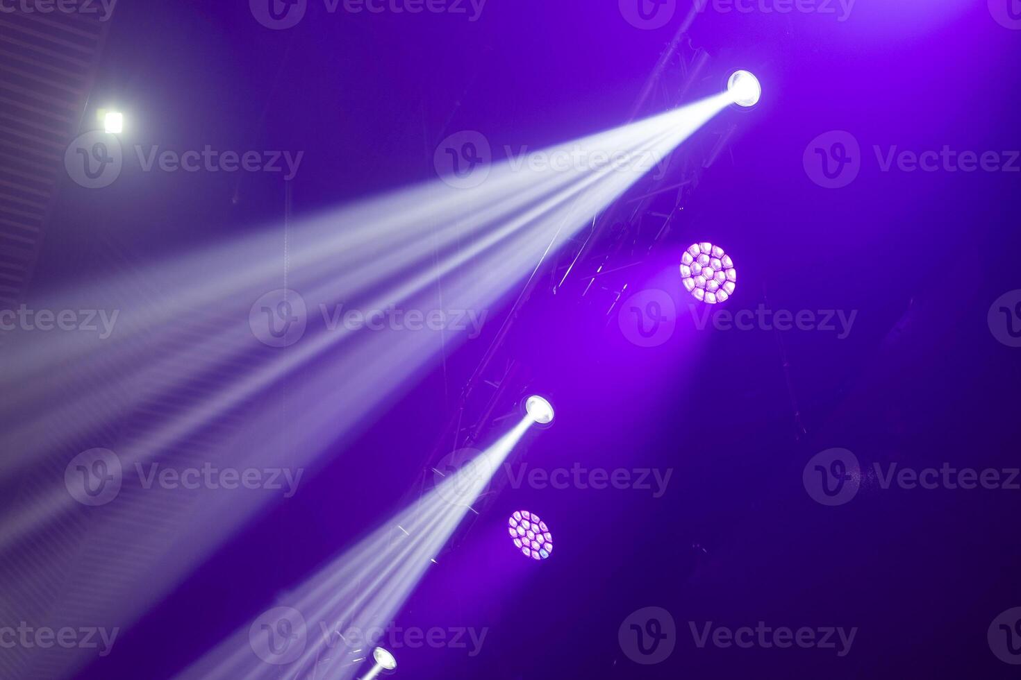Stage lighting fixtures, blue, purple and pink lighting. photo