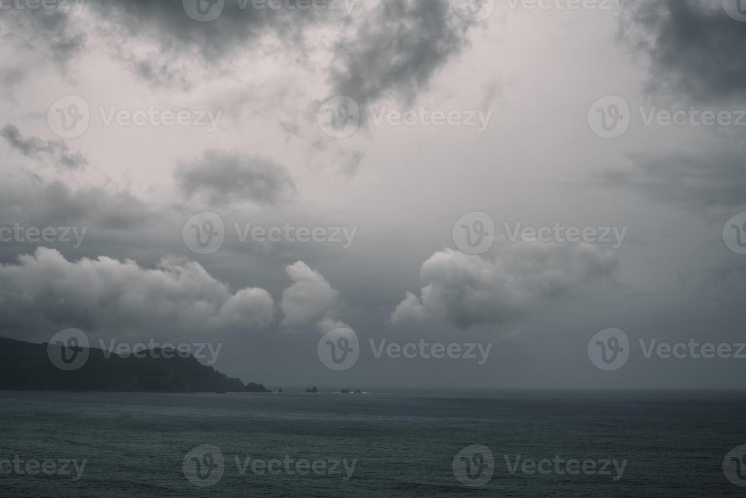 Some low clouds near Cabo Ortegal on a leaden rainy day photo
