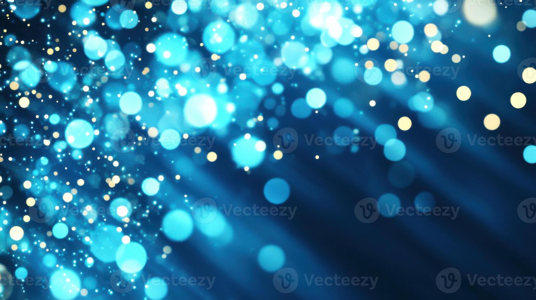 Captivating blue background with glowing snowflakes and shimmering light rays creating a festive winter atmosphere for holiday celebrations photo