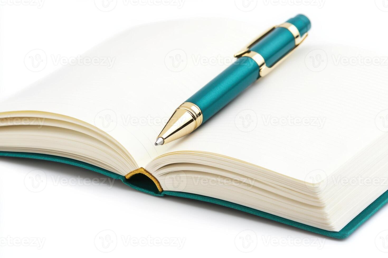Open notebook with pastel pink pages and teal pen resting on a clean white desk for creative ideas and reflections photo