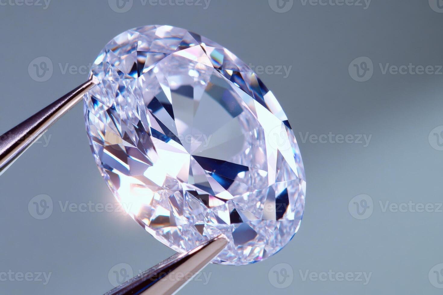 Oval diamond held by tweezers highlights exquisite craftsmanship against a gradient gray background photo