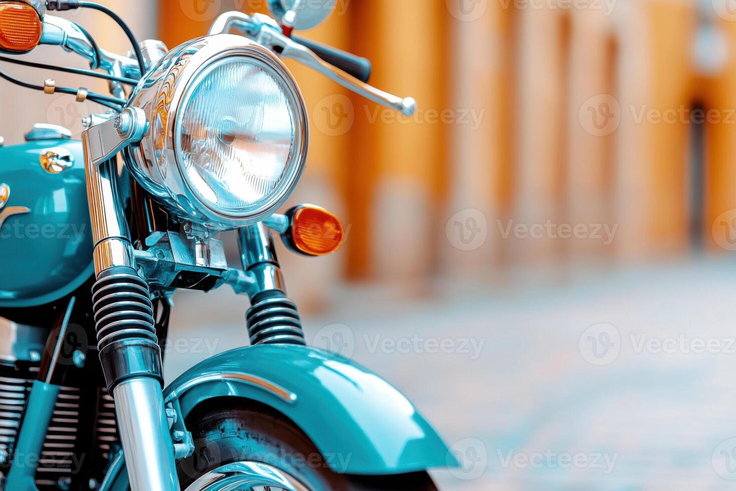 Motorcycle with dark blue tank and warm gray frame parked on a cobblestone street with subtle terracotta accents in a charming urban setting photo