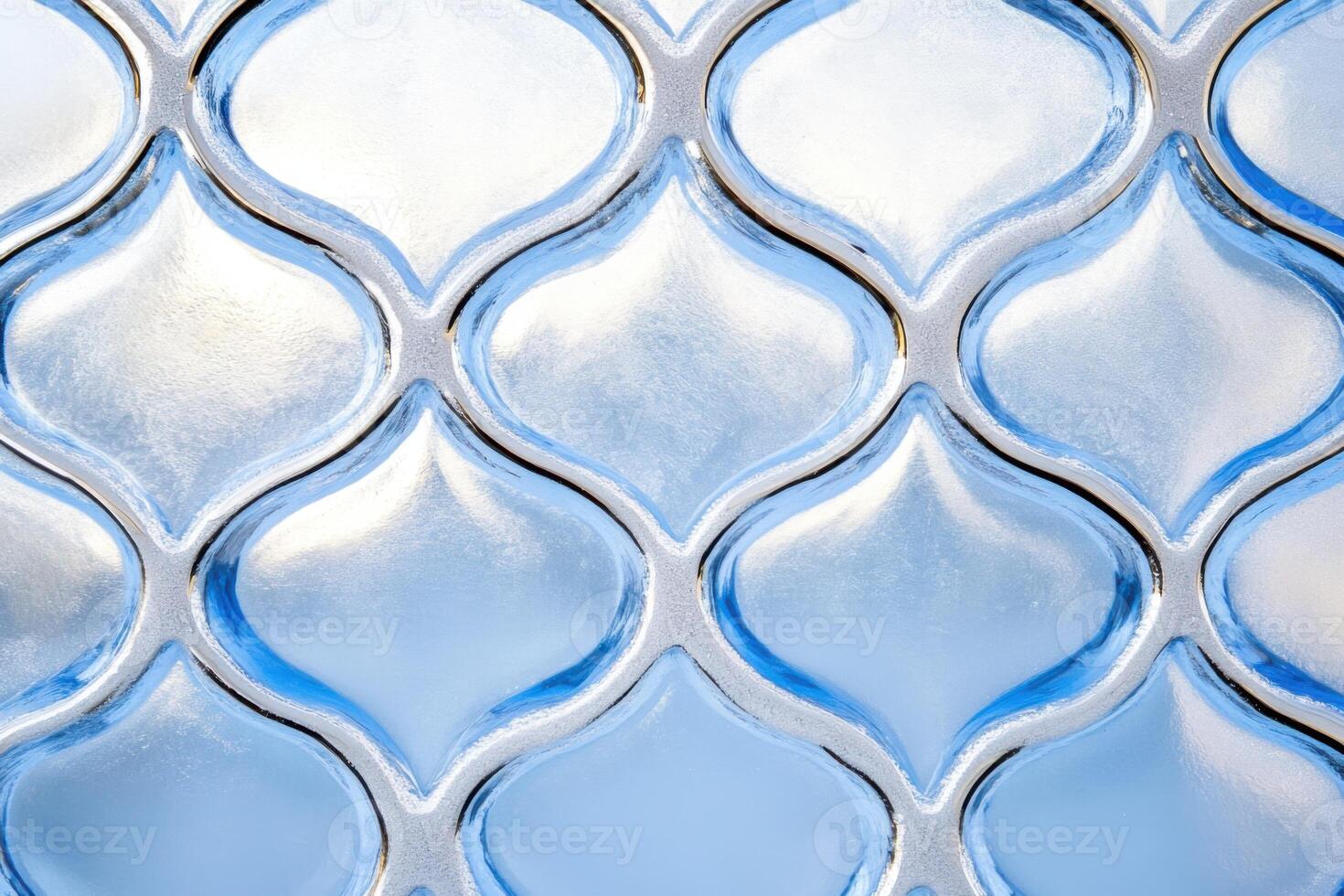 Frosty window patterns in soft light with pale sky-blue and white-gray hues creating a serene winter atmosphere photo