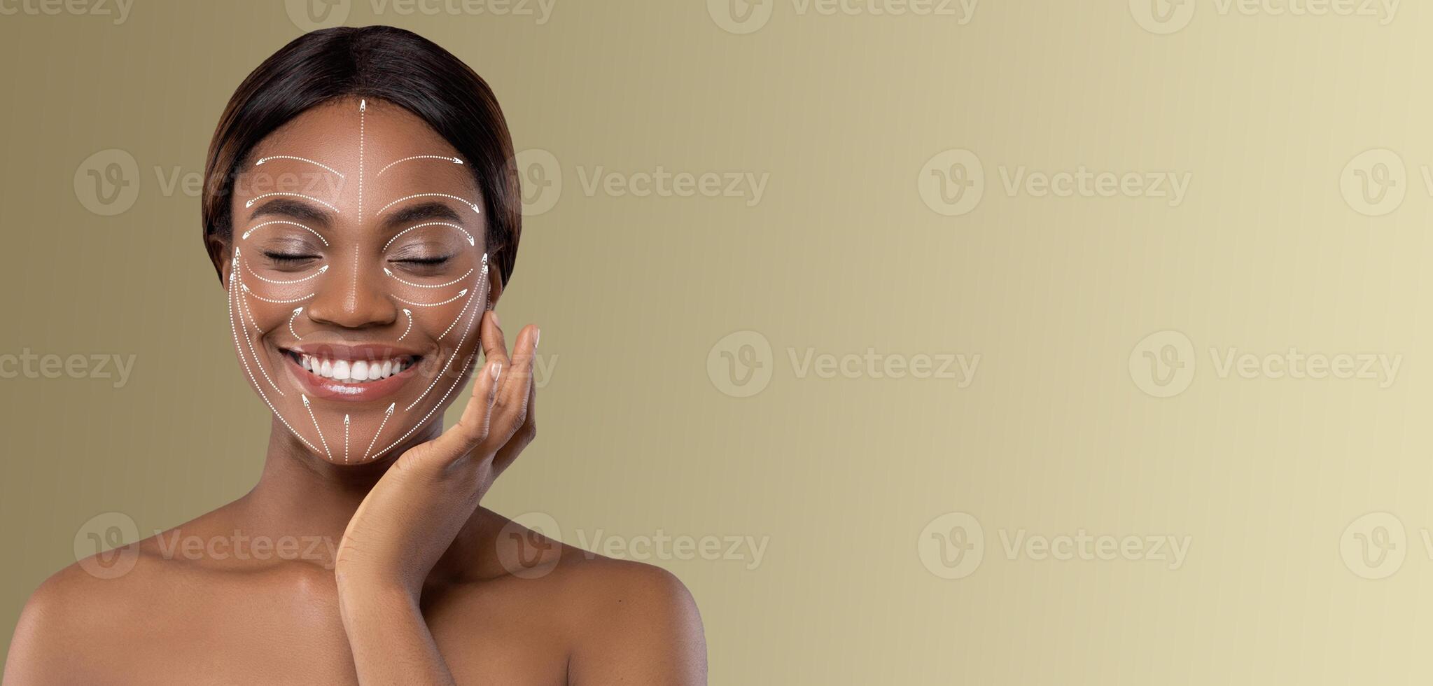 African American lady is relaxing and pampering herself with a skincare routine. She smiles while applying a beauty treatment, surrounded by a soothing, isolated environment photo