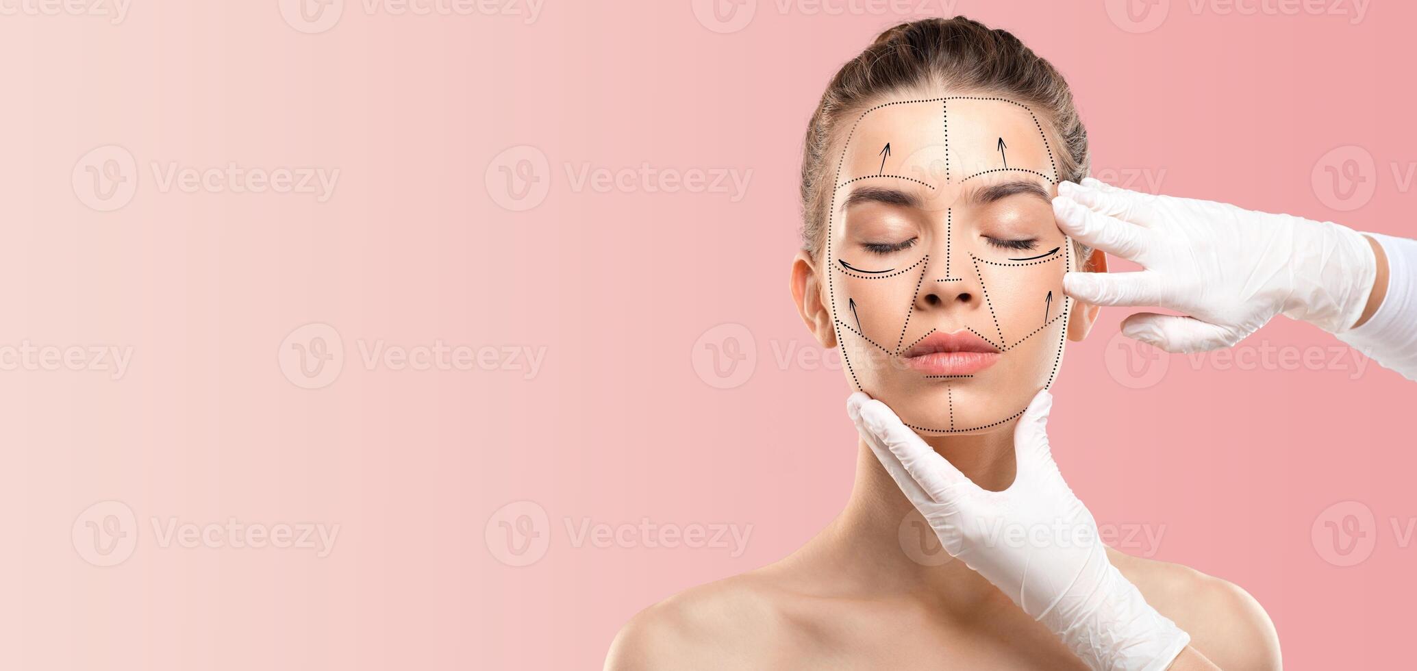 A woman engages in a focused skin care routine, applying techniques to enhance her beauty and well-being in a serene setting. Her expression reflects relaxation and care. photo