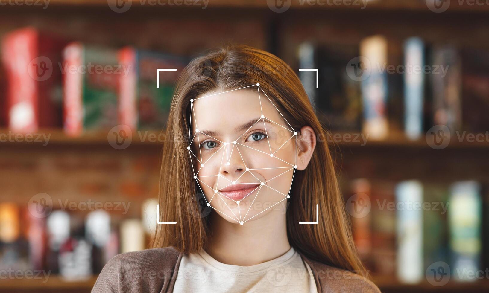 A young woman smiles as facial recognition technology analyzes her features in a library surrounded by books. The focus is on her face, highlighting advanced ID technology in use. photo