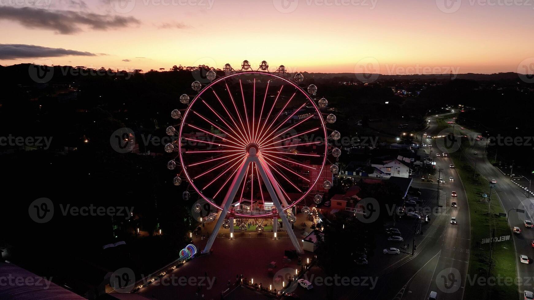 High Angle of Illuminated Ferris Wheel in Canela Rio Grande do Sul Brazil. photo