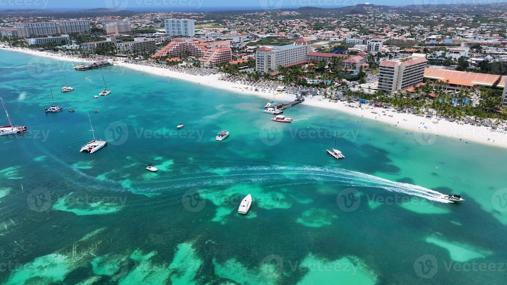 Famous Palm Beach in Oranjestad Caribbean Netherlands Aruba . Sunlight Amazing. photo